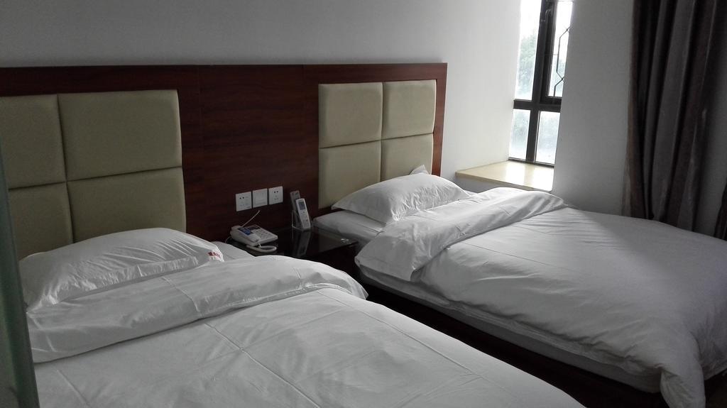 Guangzhou Xingyi Hotel Room photo